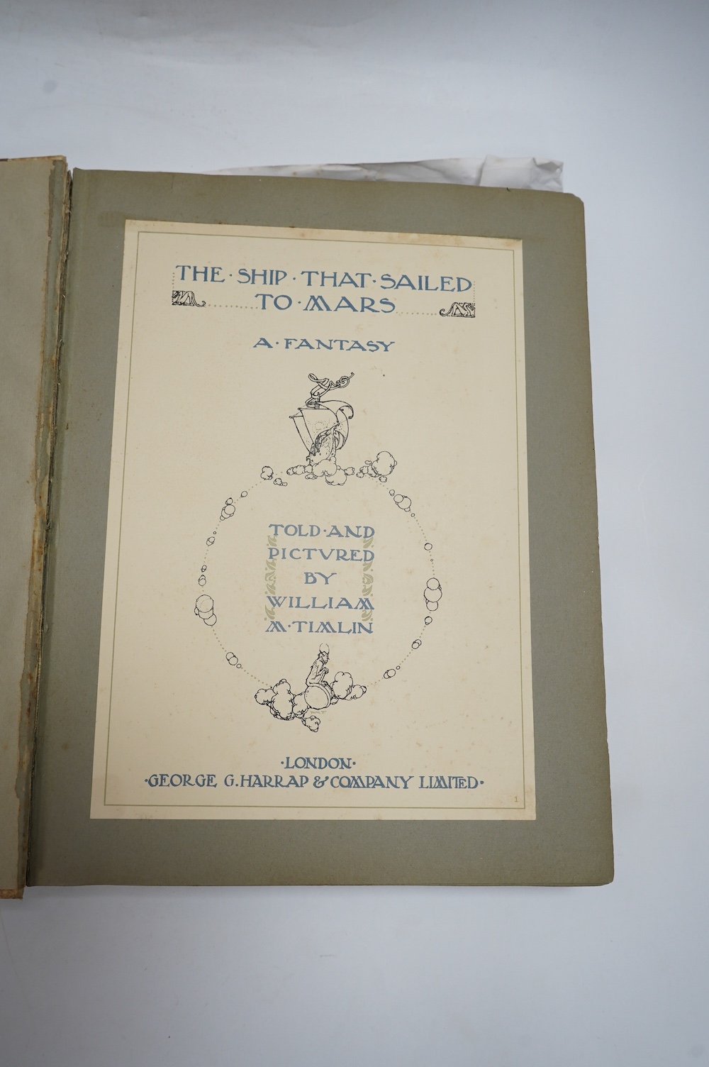 Timlin, William M. (1894-1943) - The Ship That Sailed to Mars. A Fantasy, 4to, original vellum backed grey brown boards, dust jacket ragged at extremities and with loss to foot of spine, with 48 colour plates on grey art